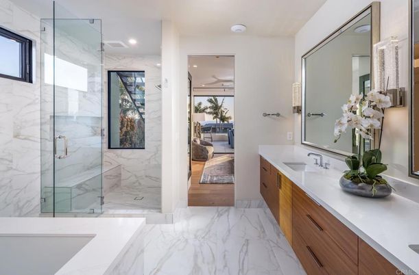 Bathroom, Dual Sink Vanities, Glass Shower, Interior, Marble, Marble Walls, Recessed Lighting