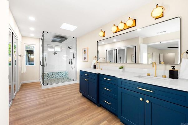 Bathroom, Dual Sink Vanities, Glass Shower, Interior, Recessed Lighting, Wood Texture Flooring