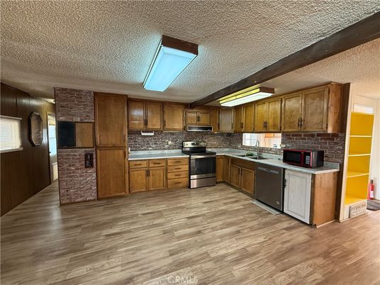 Interior, Kitchen, Stainless Steel Appliances, Stone Walls, Wood Texture Flooring