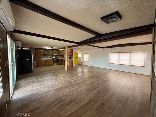Empty room, Interior, Kitchen, Stainless Steel Appliances, Wood Texture Flooring