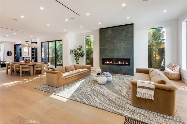 Dining room, Fireplace, Interior, Living room, Pendant Lights, Recessed Lighting, Wood Texture Flooring