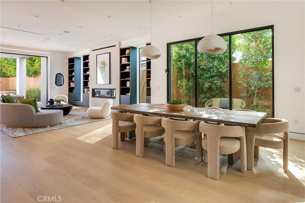 Dining room, Fireplace, Interior, Living room, Pendant Lights, Recessed Lighting, Wood Texture Flooring