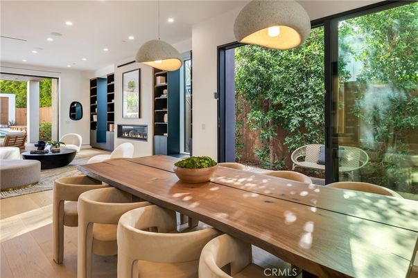 Dining room, Fireplace, Interior, Living room, Pendant Lights, Recessed Lighting, Wood Texture Flooring