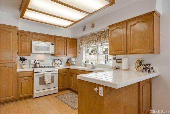 Interior, Kitchen, Tile Countertops, Wood Texture Flooring