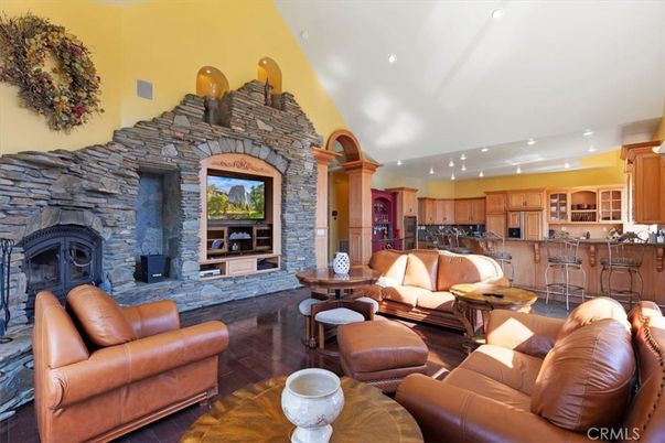 Fireplace, Interior, Kitchen, Living room, Recessed Lighting, Stone Walls, Wood Texture Flooring