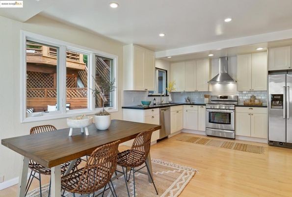 Dining room, Interior, Kitchen, Recessed Lighting, Stainless Steel Appliances, Wood Texture Flooring