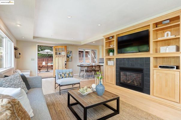 Dining room, Fireplace, Interior, Living room, Recessed Lighting, Wood Texture Flooring