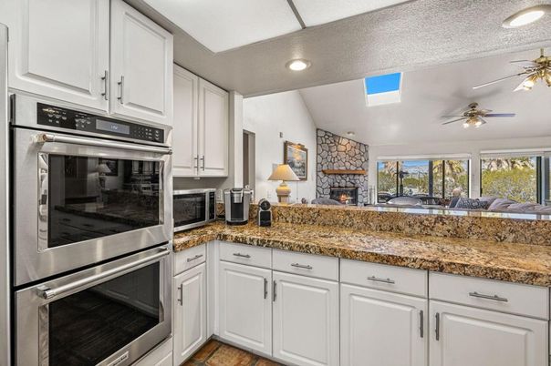 Fireplace, Interior, Kitchen, Recessed Lighting, Stone Walls