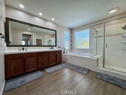 Bathroom, Dual Sink Vanities, Glass Shower, Interior, Recessed Lighting, Tile Countertops