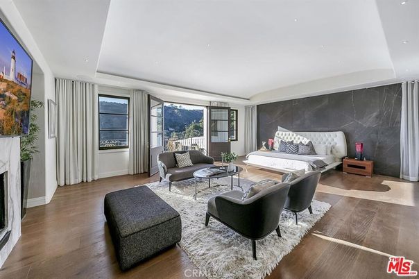 Bedroom, Fireplace, Interior, Living room, Marble Walls, Recessed Lighting, Wood Texture Flooring