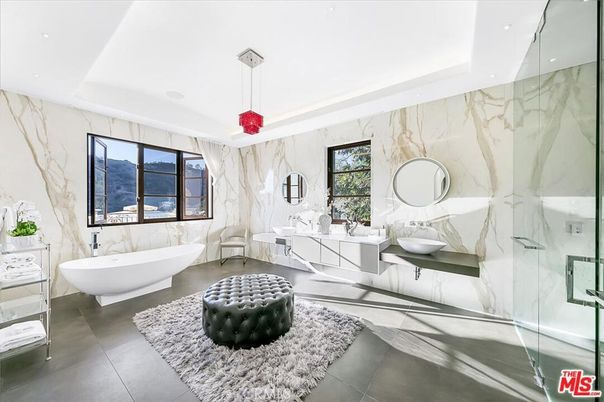 Bathroom, Dual Sink Vanities, Free Standing Baths, Glass Shower, Interior, Marble Walls, Pendant Lights, Recessed Lighting