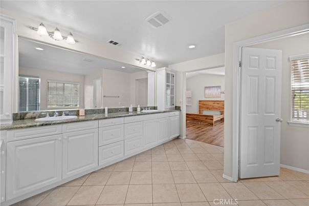 Bathroom, Dual Sink Vanities, Interior, Recessed Lighting, Wood Texture Flooring