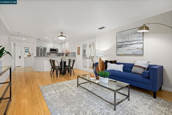 Dining room, Interior, Kitchen, Living room, Recessed Lighting, Stainless Steel Appliances, Wood Texture Flooring