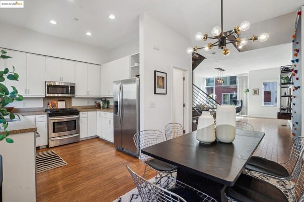 Dining room, Interior, Kitchen, Pendant Lights, Recessed Lighting, Stainless Steel Appliances, Wood Texture Flooring