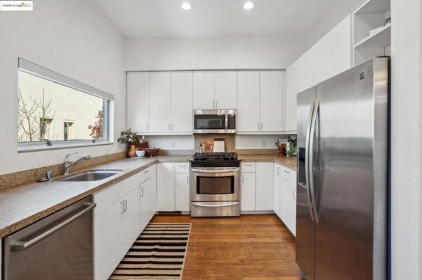 Interior, Kitchen, Recessed Lighting, Stainless Steel Appliances, Wood Texture Flooring