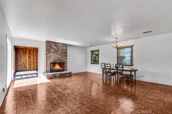 Chandelier, Dining room, Fireplace, Interior, Wood Texture Flooring
