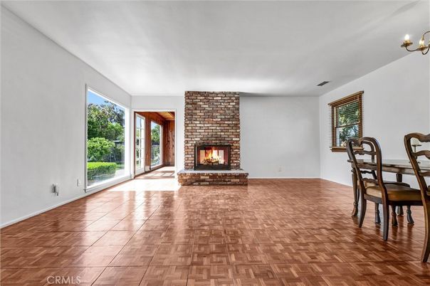 Chandelier, Dining room, Fireplace, Interior, Wood Texture Flooring