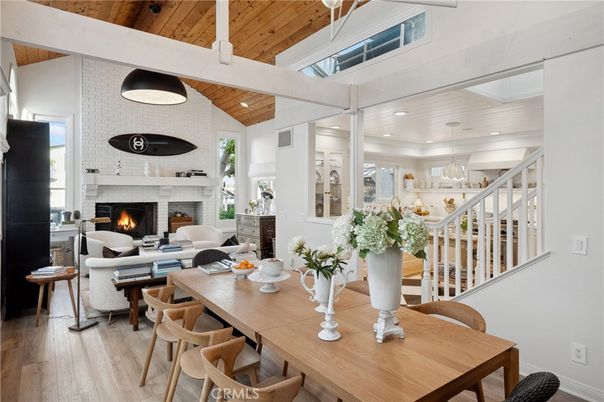 Dining room, Fireplace, Interior, Living room, Recessed Lighting, Stone Walls, Wooden Ceilings, Wood Texture Flooring