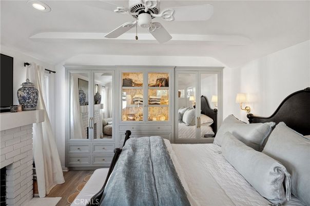 Bedroom, Fireplace, Interior, Recessed Lighting, Wood Texture Flooring