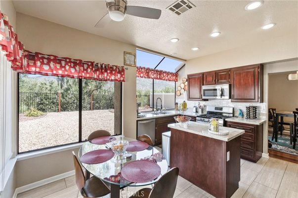 Dining room, Interior, Kitchen, Recessed Lighting, Stainless Steel Appliances, Wood Texture Flooring