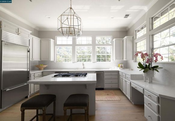Chandelier, Interior, Kitchen, Pendant Lights, Recessed Lighting, Stainless Steel Appliances, Wood Texture Flooring