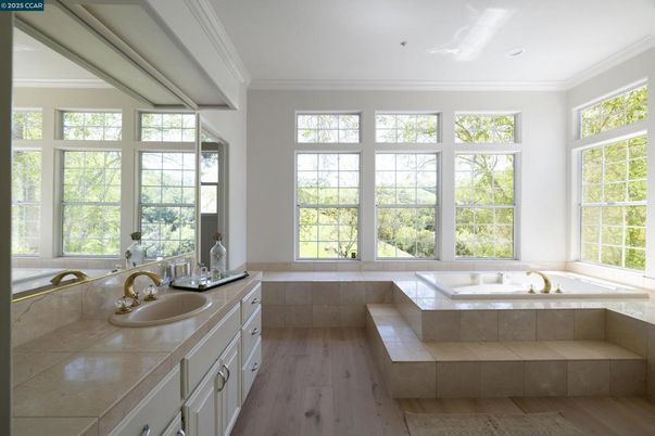 Bathroom, Dual Sink Vanities, Interior, Recessed Lighting, Tile Countertops, Wood Texture Flooring