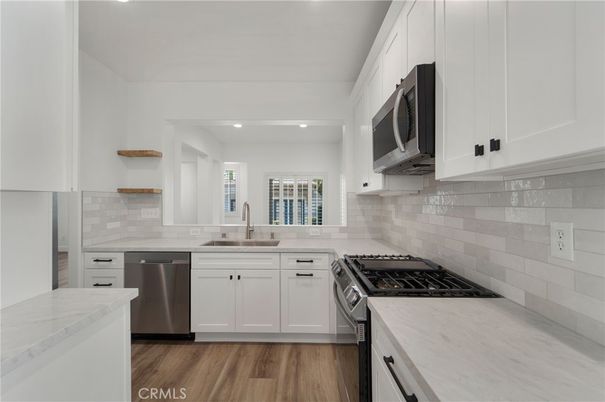 Interior, Kitchen, Recessed Lighting, Stainless Steel Appliances, Wood Texture Flooring