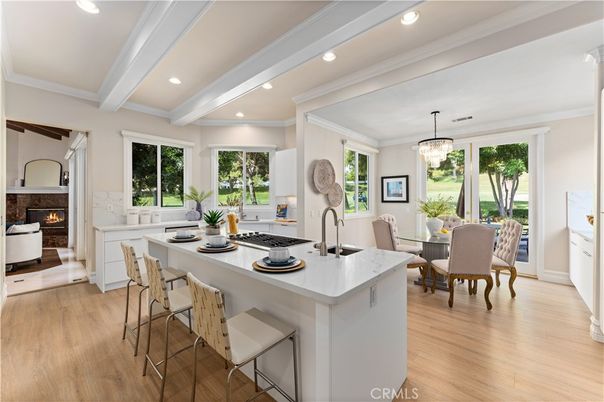 Chandelier, Dining room, Fireplace, Interior, Kitchen, Living room, Recessed Lighting, Wood Texture Flooring