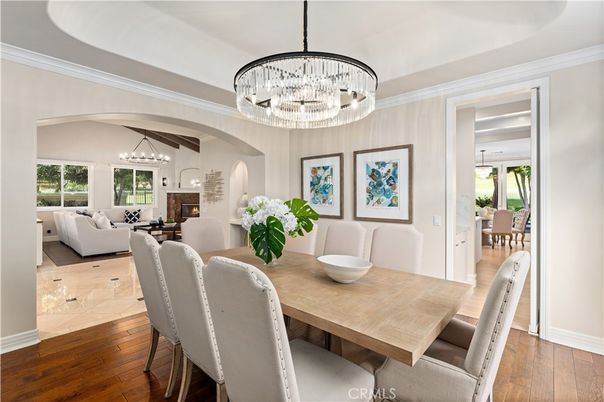 Chandelier, Dining room, Fireplace, Interior, Living room, Pendant Lights, Wood Texture Flooring