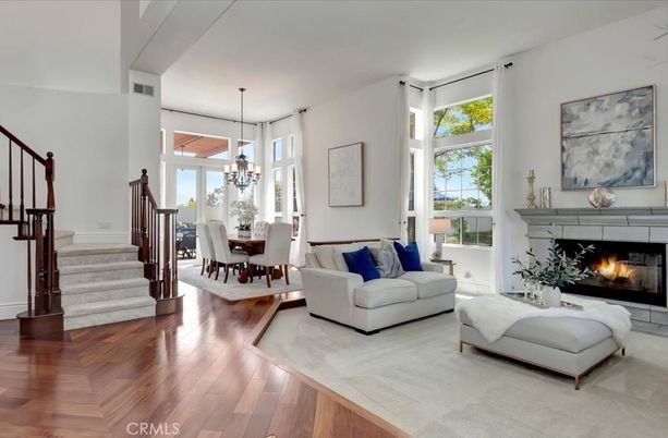 Chandelier, Dining room, Fireplace, Interior, Living room, Pendant Lights, Wood Texture Flooring