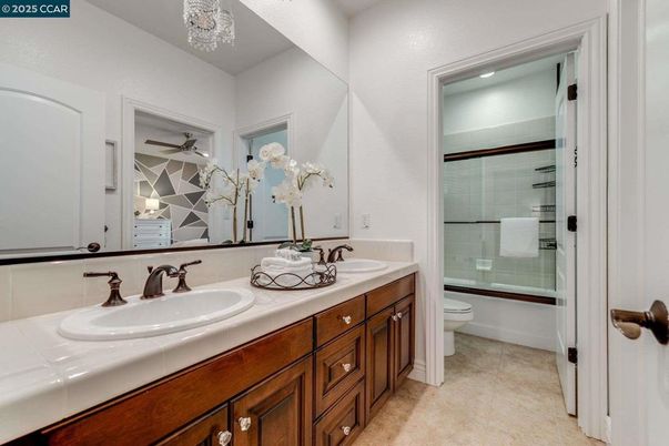 Bathroom, Dual Sink Vanities, Glass Shower, Interior, Tile Countertops