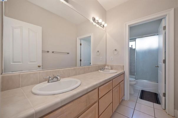 Bathroom, Dual Sink Vanities, Glass Shower, Interior, Tile Countertops