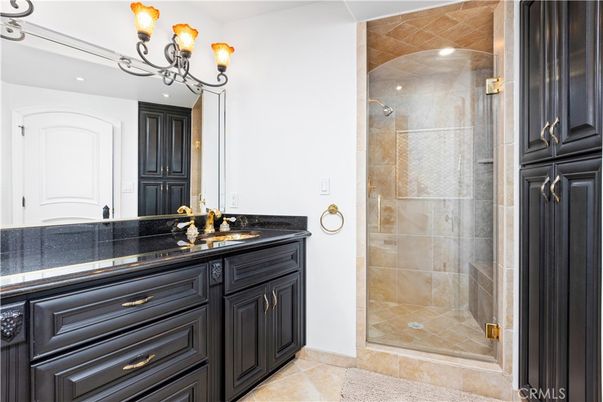 Bathroom, Chandelier, Glass Shower, Interior, Recessed Lighting, Tile Countertops