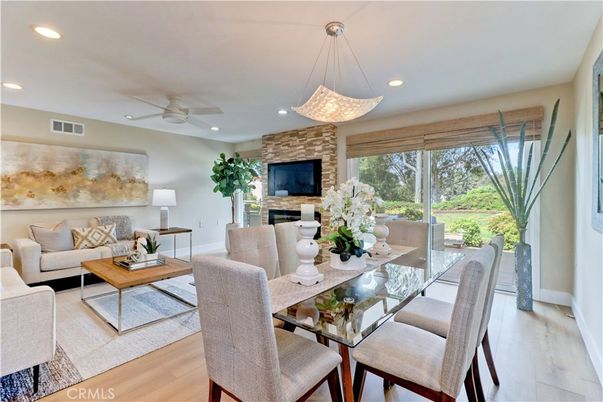 Dining room, Fireplace, Interior, Living room, Pendant Lights, Recessed Lighting, Stone Walls, Wood Texture Flooring