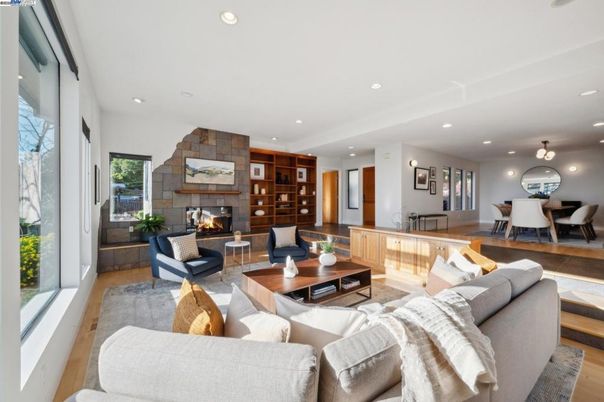 Dining room, Fireplace, Interior, Living room, Pendant Lights, Recessed Lighting, Stone Walls, Wood Texture Flooring