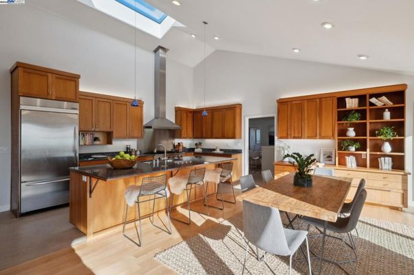 Dining room, Interior, Kitchen, Pendant Lights, Recessed Lighting, Stainless Steel Appliances, Wood Texture Flooring