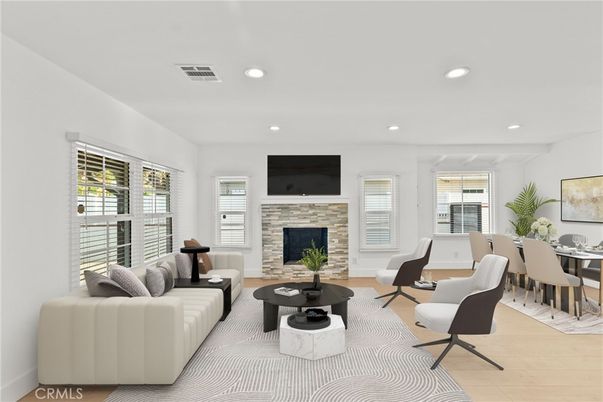 Dining room, Fireplace, Interior, Living room, Recessed Lighting, Wood Texture Flooring