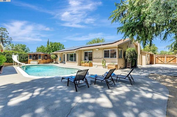 Exterior, Pool, Solar Panels