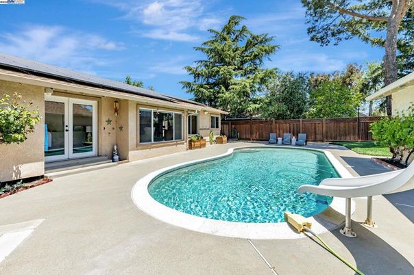 Exterior, Pool, Solar Panels