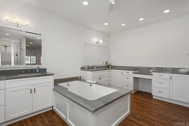 Bathroom, Dual Sink Vanities, Interior, Recessed Lighting, Wood Texture Flooring