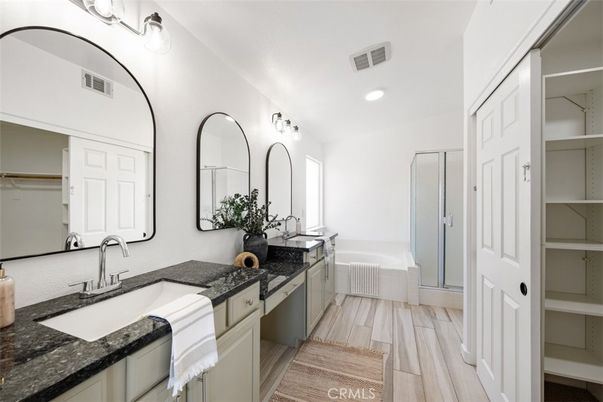 Bathroom, Dual Sink Vanities, Interior, Recessed Lighting, Wood Texture Flooring