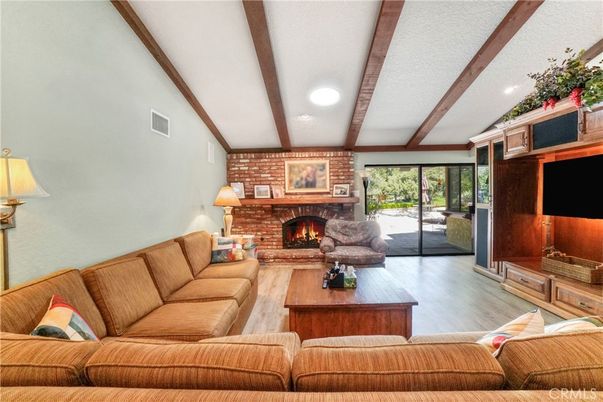 Fireplace, Interior, Living room, Recessed Lighting, Stone Walls, Wooden Beams, Wood Texture Flooring