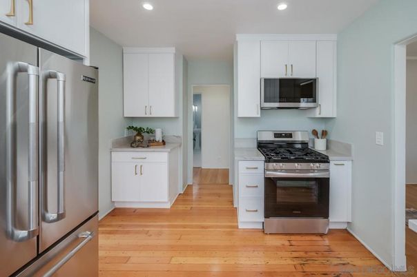 Interior, Kitchen, Recessed Lighting, Stainless Steel Appliances, Wood Texture Flooring