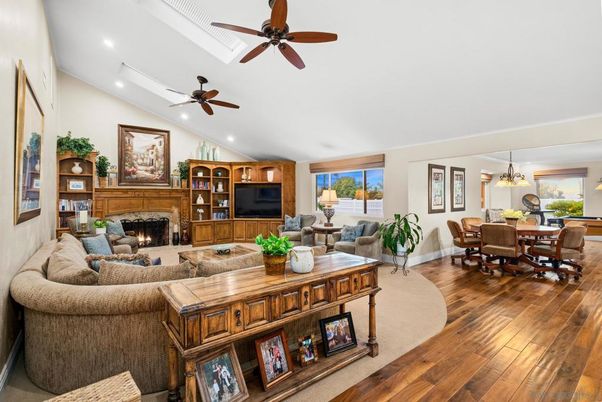 Dining room, Fireplace, Interior, Living room, Pendant Lights, Recessed Lighting, Wood Texture Flooring