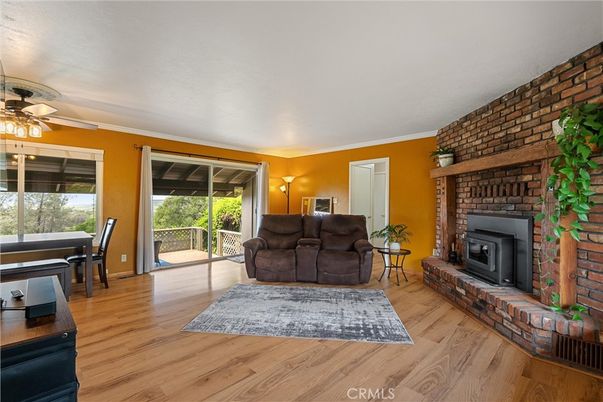 Dining room, Fireplace, Interior, Living room, Stone Walls, Wood Texture Flooring
