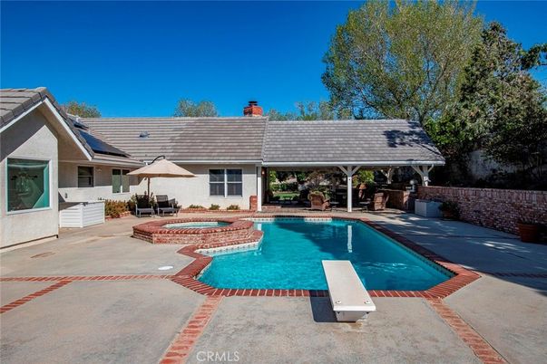 Exterior, Pool, Solar Panels