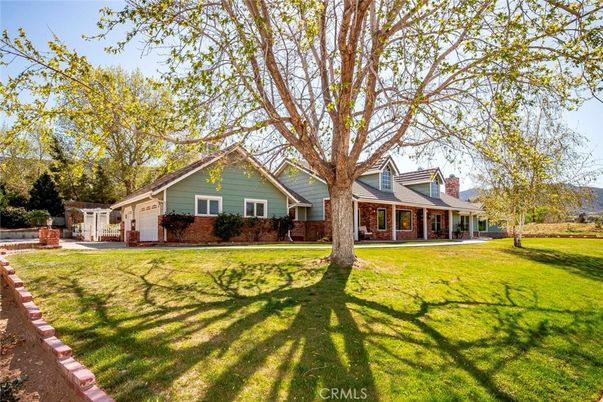 Attached, Backyard, Exterior, Facade, Brick Facade, Cape Cod