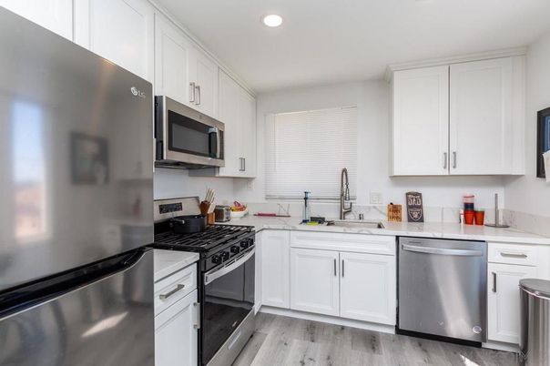 Interior, Kitchen, Recessed Lighting, Stainless Steel Appliances, Wood Texture Flooring