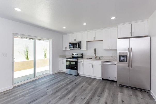 Interior, Kitchen, Recessed Lighting, Stainless Steel Appliances, Wood Texture Flooring