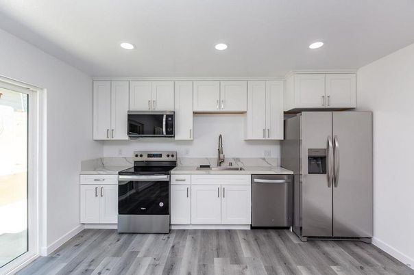 Interior, Kitchen, Recessed Lighting, Stainless Steel Appliances, Wood Texture Flooring